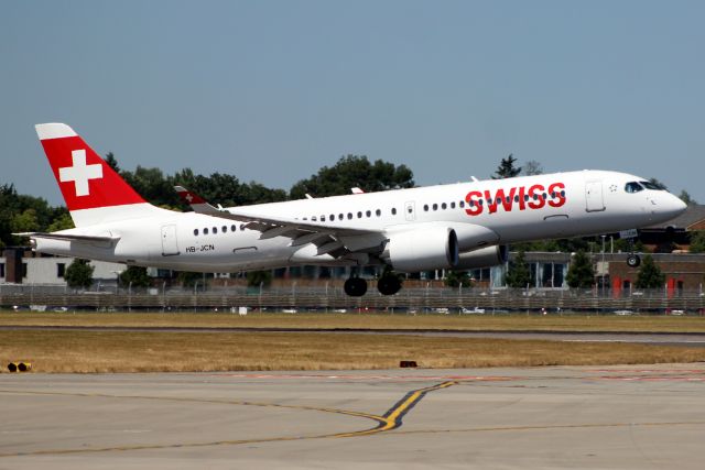 Airbus A220-300 (HB-JCN) - On short finals for rwy 09L on 2-Jul-18 operating flight SWR354 from LSGG on its first visit to EGLL.