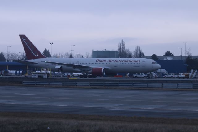 — — - Sorry about the lighting - it was early in the AM. Omni Air B-767-3Q8 at SEA Thurs. 26 Jan. N477AX