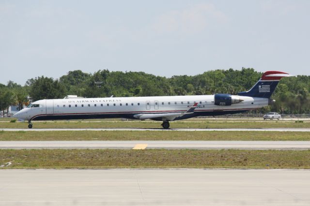 Canadair Regional Jet CRJ-900 (N926LR) - Mesa/US Air Flight 2662 (N926LR) departs Runway 32 at Sarasota-Bradenton International Airport enroute to Charlotte-Douglas International Airport