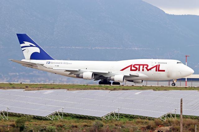 Boeing 747-400 (TF-AMM) - A rare visitor leaving Athens today. An Astral Aviaton B744F ready for take off unfortunately under rainy conditions.