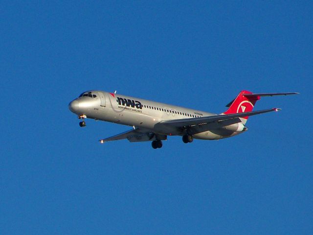 McDonnell Douglas DC-9-40 (N755NW) - The first light of day really plays well off of the simple NWA silver paint. This old bird is of 1968 vintage, it wont be long before it is retired by October.