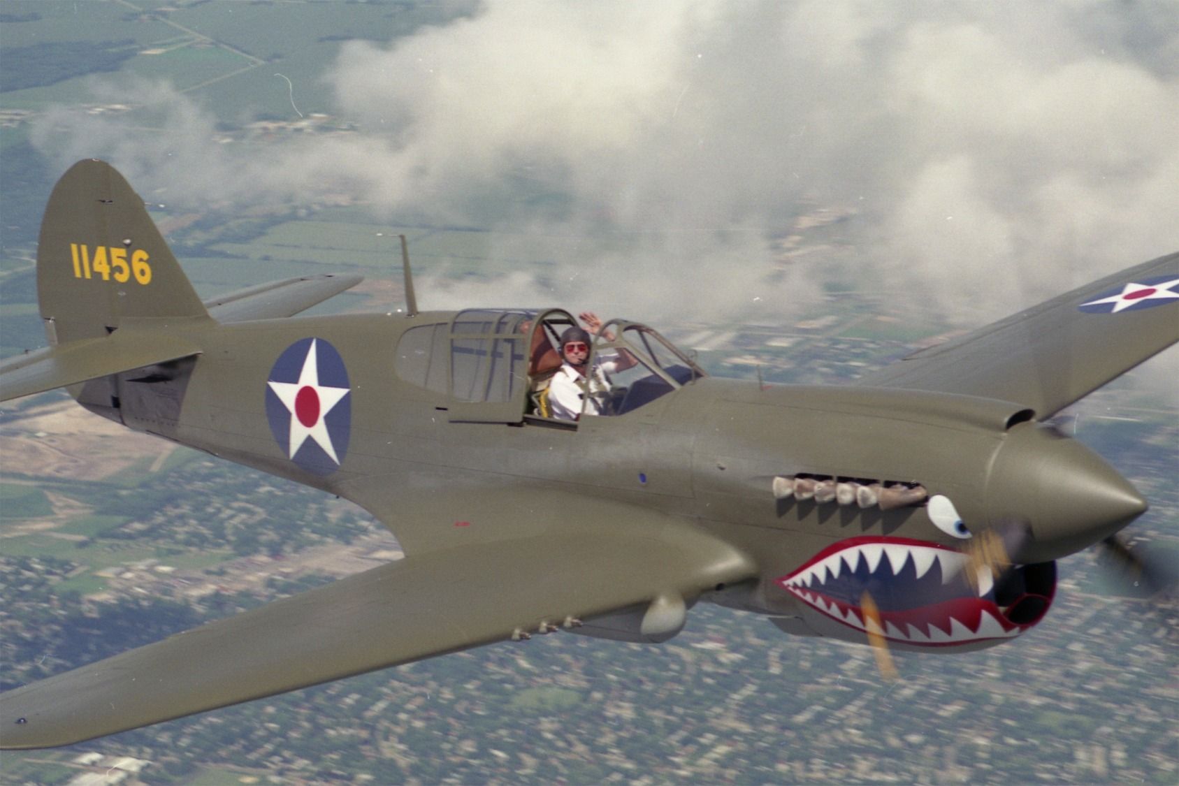 CURTISS Warhawk — - P-40 over Wisconsin. Pilot Dick Wixom. Photographed by Larry Wixom.  Photo Plane was a C-170!