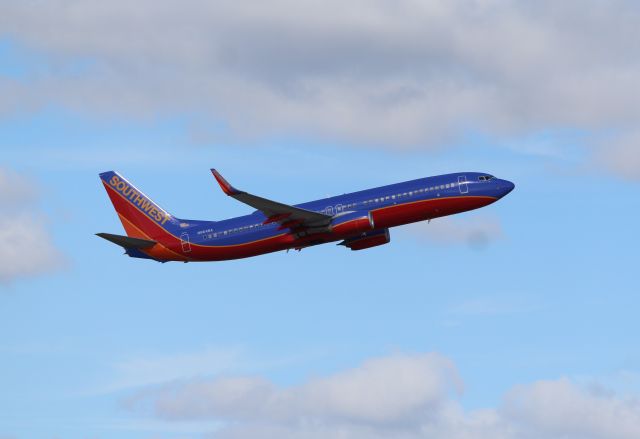 Boeing 737-800 (N8648A) - Southwest Airlines (WN) N8648A B737-8H4 [cn42531]br /Fort Lauderdale (FLL). Southwest Airlines flight WN1538 departing from runway 10L for Washington Reagan National (DCA). Despite being a 2014 delivery, the aircraft is captured wearing Southwest’s Canyon Blue Livery introduced in 2001 and but since September 2014 being replaced by the Heart livery.br /Taken from Hibiscus/Terminal 1 car park roof level br /br /2018 12 25br /https://alphayankee.smugmug.com/Airlines-and-Airliners-Portfolio/Airlines/AmericasAirlines/Southwest-Airlines-WN/