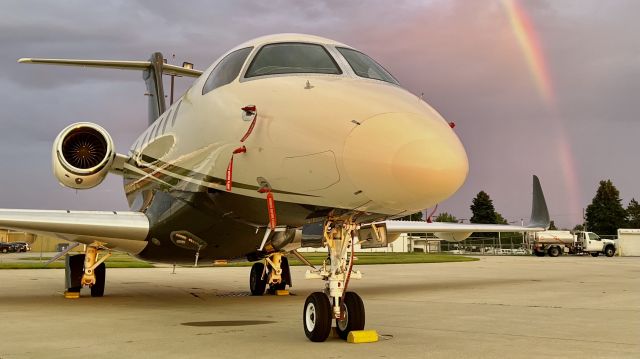 Embraer Legacy 450 (N405FX) - Some of my favorite pics I’ve taken in a while. N405FX, a 2016 Embraer Legacy 450, posing in-front of a rainbow during golden hour. 8/3/22. 