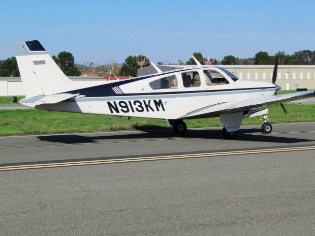 Beechcraft Bonanza (33) (N913KM) - Taxiing to RWY 24