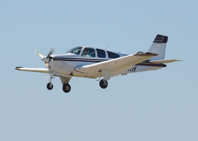 Beechcraft Bonanza (36) (N717KH) - Short final to Runway 5