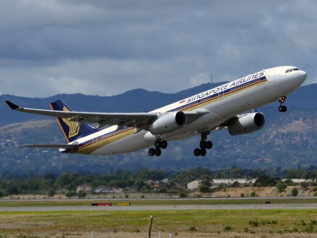 Airbus A330-300 (9V-STK) - Getting airborne off runway 23 and heading home to Singapore. Saturday, 24th March 2012.