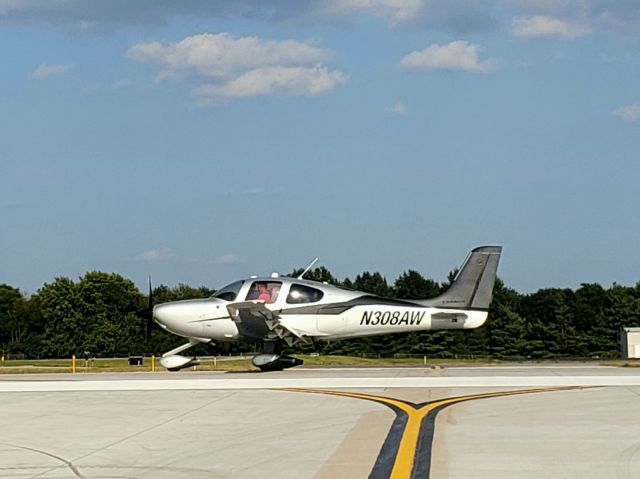 Cirrus SR22 Turbo (N308AW) - captured while holding short of runway