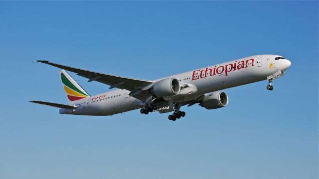 BOEING 777-300 (ET-APY) - BOE387 flies a missed approach to Rwy 16R during a flight test on 1/20/14. (LN:1169 cn 42102).