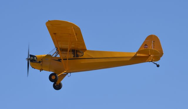 Piper NE Cub (N7127P) - This is a J3C-65 Piper Cub not an NE Cub. It is based out of a hanger at Corona airport. I didnt have a chance to talk to the owner because he was already "hand propping" it when I got there. The day that I took this was the second hottest of the Summer so far with temps around 105 degrees. I took it around 9am, but it was already pretty hot so most of the pictures of this one on the ground were pretty distorted.