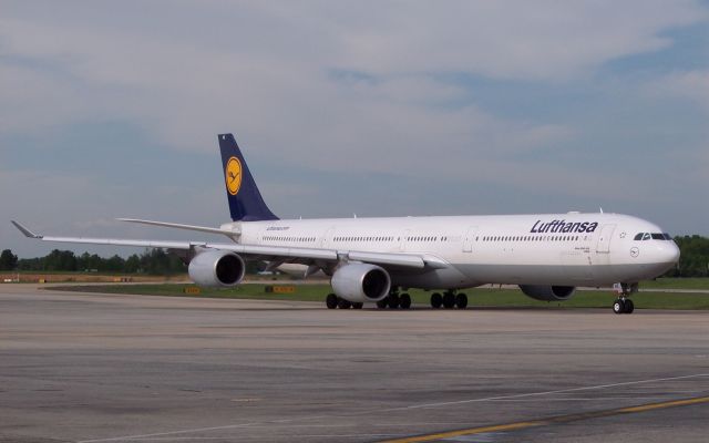 Airbus A340-600 (D-AIHZ) - Just pushed from gate D12 for a flight to Munich Germany