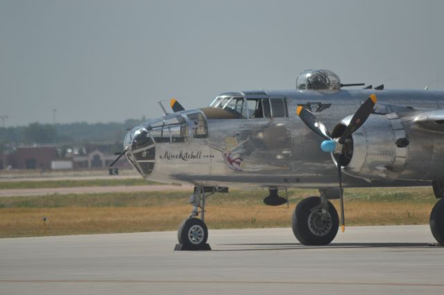 N27483 — - Nose Art of the North American B-25J "Miss Mitchell" sitting on the tarmac in KFSD - 7-17-2012