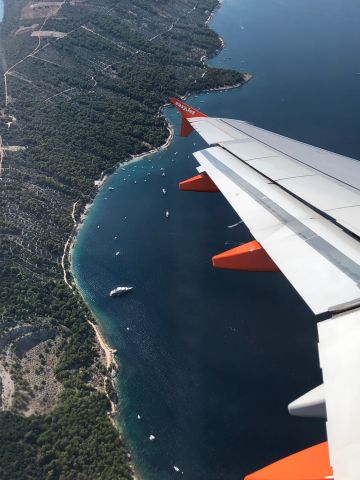 Airbus A319 (OE-LKK) - On final descent to Split airport, Croatia.