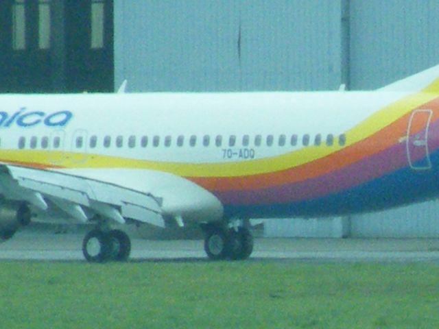 Boeing 737-800 (7O-ADQ) - 70-ADQ  BOEING 737-8Q8WL   CN 30730/2399 OF YEMENIA AIRWAYS WHICH HAS NOW BEEN PAINTED IN AIR JAMAICA COLOURS ON THIS SIDE OF PLANE IT HAS 70-ADQ WHILE ON OTHER SIDE IT HAS 9Y-JMH WHICH YOU WILL SEE IN MY OTHER PICTURES THIS PLANE HAS BOTH REGISTRATIONS ON THE PLANE AT SHANNON JULY 20 2011