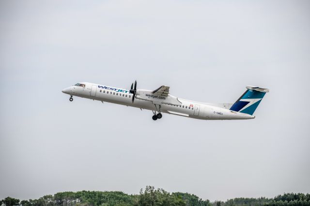 de Havilland Dash 8-400 (C-GWEU) - Westjet departing the Grande Prairie Airport