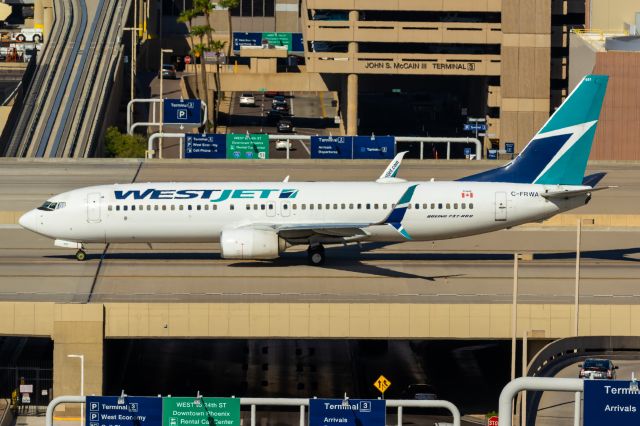 Boeing 737-800 (C-FRWA) - WestJet 737-800 taxiing PHX on 9/17/22. Taken with a Canon 850D and a Canon EF 70-200mm f/2.8L IS II USM lens. 