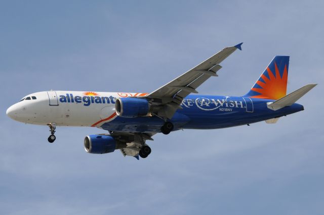 Airbus A320 (N218NV) - Its Summer. Its Hot. Its Humid. Its Hazy. Add to that, 3:20 PM sun on the nose, and well, even with all that going against you, a special paint scheme aircraft is always welcomed in my view-finder! My first Allegiant A320 to catch, and glad it was this one. Made my wish come true, thats for sure! AAY A320 N218NV short final for 23-L @ KIND.