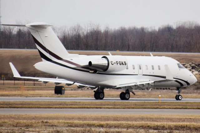 Canadair Challenger (C-FGKS) - Privately owned Bombardier Challenger 605 departing Runway 14 at the Buffalo Niagara International Airport for CYHM