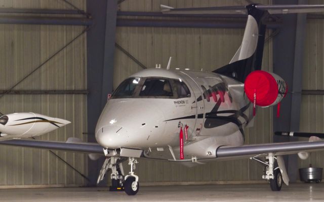 Embraer Phenom 100 (N21SB) - Sitting in the Del Sol Hangar