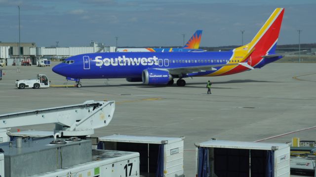 Boeing 737 MAX 8 (N8824Q) - This Southwest Airlines BRAND NEW Boeing 737 MAX 8 just arrived from Chicago's Midway Airport (MDW) to Grand Rapids, Michigan. Less than 55 minutes of flying time but still WHAT A TREAT  to see a SHINY NEW 737 MAX. Hopefully. she has all her bolts and doesn't lose her plug doors! haha! 