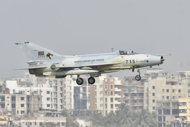 N2715 — - Bangladesh Air Force F-7BGI landing at Shahjalal International Airport in Dhaka.