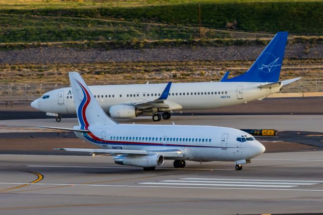 Boeing 737-200 (N467TW) - An Ameristar 737-200 taking off from PHX on 2/19/23. Taken with a Canon T7 and Tamron 70-200 G2 lens.