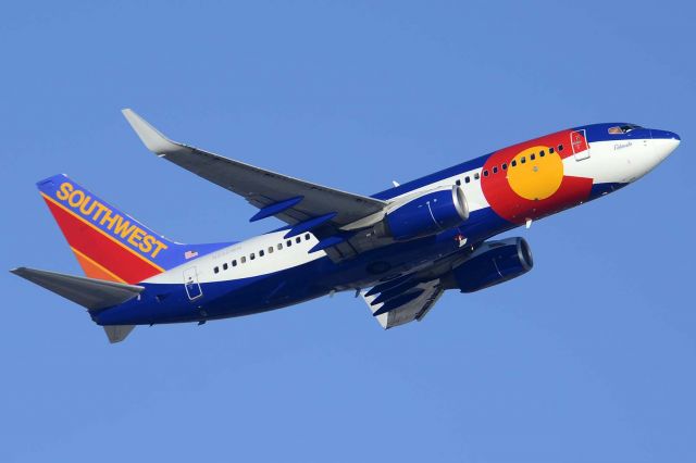 Boeing 737-700 (N230WN) - Southwest Boeing 737-7H4 N230WN Colorado on December 22, 2014. It first flew on February 1, 2005. Its construction number is 34592. It was delivered to Southwest on February 14, 2006. 