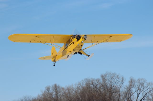 Piper NE Cub (N87984) - 65 HP and climbing with skis. 