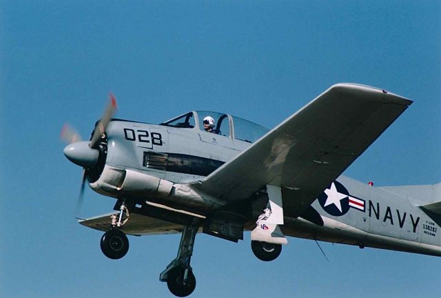 North American Trojan (NX28NB) - T-28 making a low pass with the landing gear down at T67