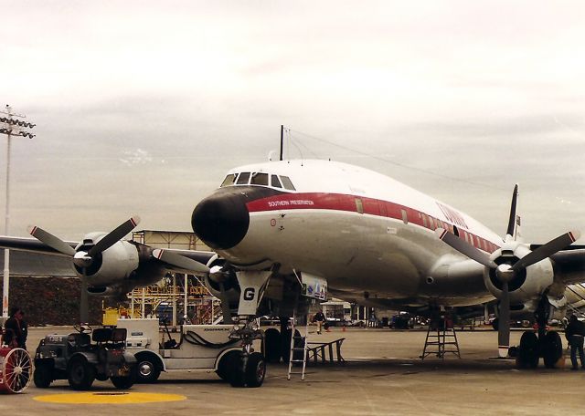 Lockheed EC-121 Constellation (VH-EAG) - KOAK- front view of the HARS Connie at KOAK in Jan 1995. The number 3 was in need of serious repair - and UAL helped but quietly. We were not allowed to take any photos of the UAL building in the same photo as the Connie. I also shot 3 hours of video and the take off from the dirt alongside the runway later.