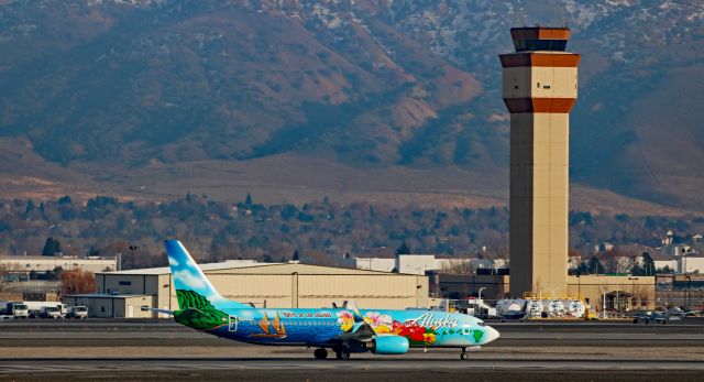 Boeing 737-800 (N560AS) - Shown here approaching Vr speed as it takes off on runway 16R, ASA's "Spirit Of The Islands" special Hawaiian livery bird departs Reno heading back to Seattle (KSEA) after making its first-ever visit to RNO.