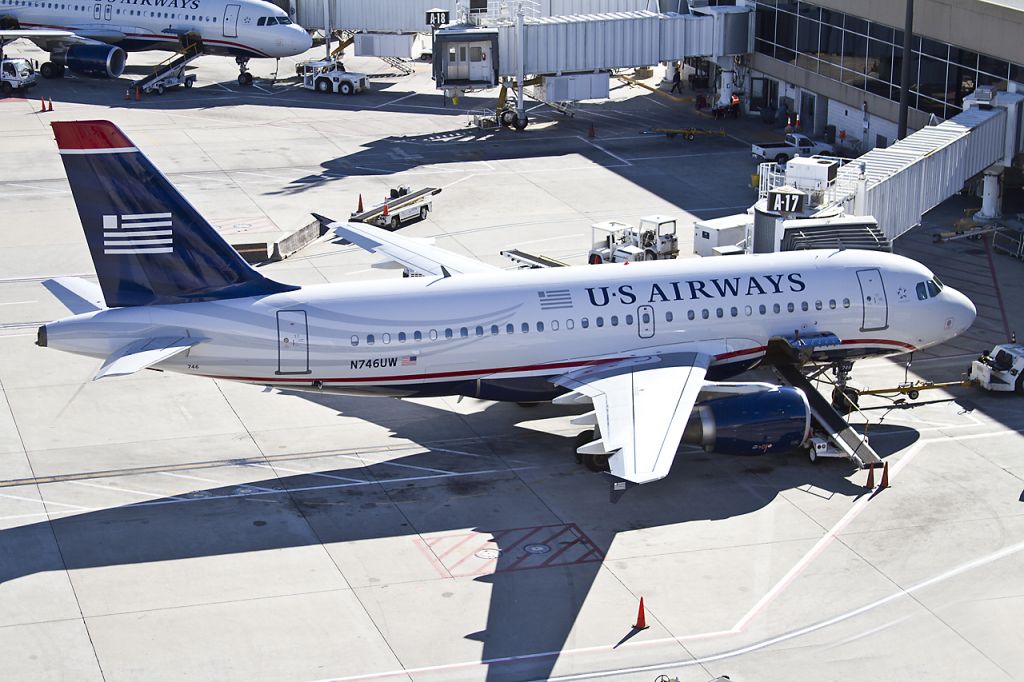 Airbus A319 (N746UW) - Parking at A-17