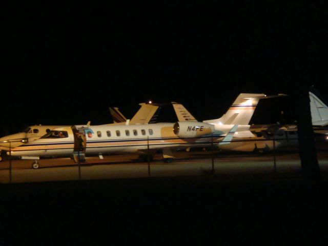 Learjet 45 (N4FE) - Leaving Fayetteville Airport after the Ole Miss/ Arkansas game. Oct. 25, 2008 Also, notice the King Air 350 starting up behind the lear.