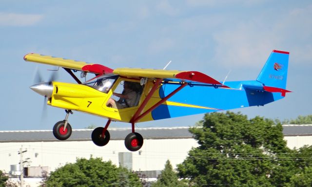 Experimental 100kts-200kts (N742SE) - A colorful experimental airplane departing at EAA AirVenture 2015!