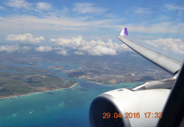 Airbus A330-200 (N384HA) - Flying HA 21 SEA to HNL. Abeam Pearl Harbor while on approach to runway 8L at HNL 