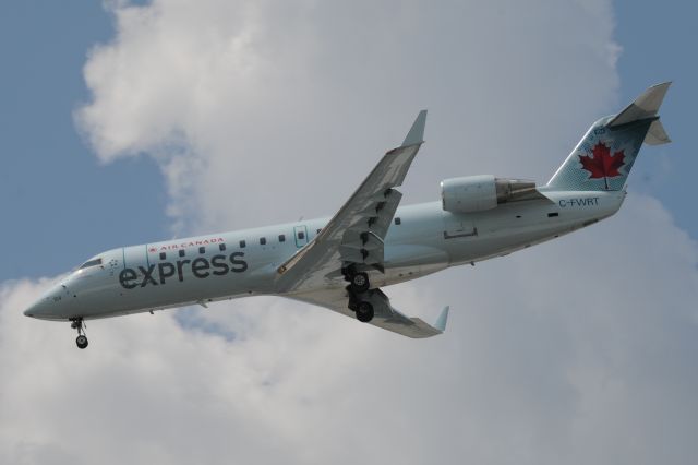 Canadair Regional Jet CRJ-200 (C-FWRT) - Dive Dive Dive..Short final R-23L at KIND.