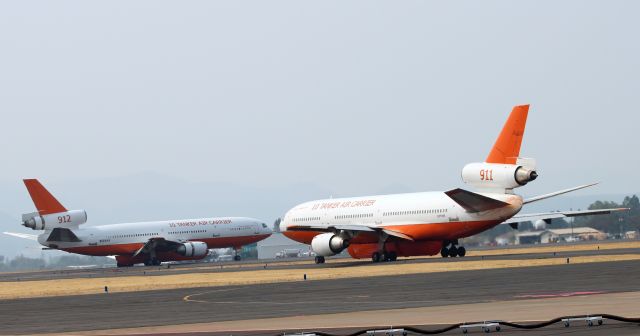 McDonnell Douglas DC-10 (N522AX) - Tanker 912 (N522AX) just after landing at Rogue Valley Intl Airport and Tanker 911 (N17085) getting ready to head out for the 790 Fire in Southern Oregon. Taken September 7th 2014.