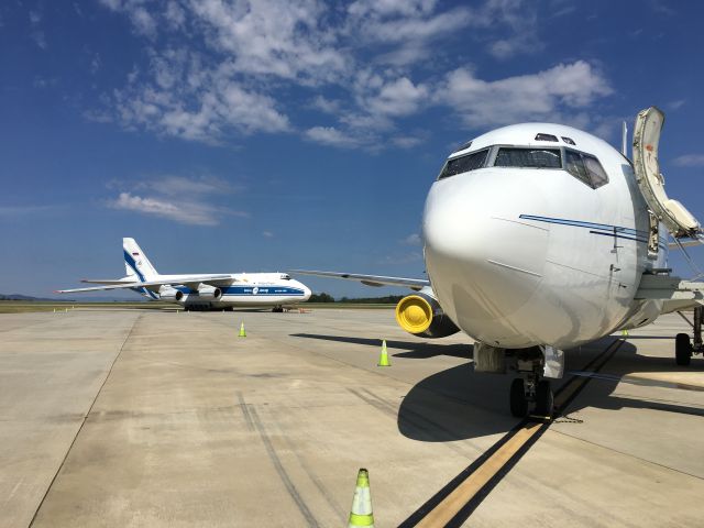 Boeing 737-200 (N467TW) - Two rare birds! About the only way a 737 can dwarf the AN-124!