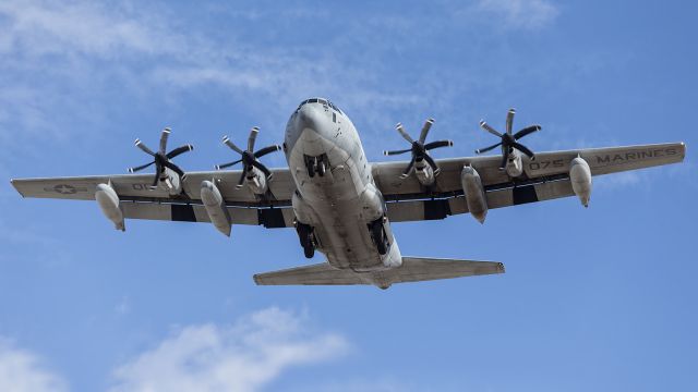 — — - US MARINES, C130  on short finals.