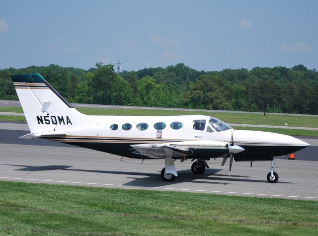 Cessna Chancellor (N50MA) - RESTAURANT MANAGEMENT GROUP LLC taxiing home at KJQF - 5/24/12