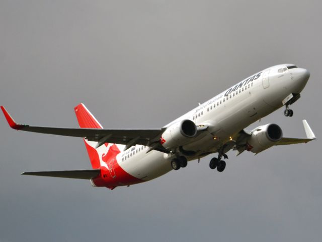 Boeing 737-800 (VH-VXD) - Getting airborne off runway 23 on a gloomy, cold winters day. Wednesday 4th July 2012.