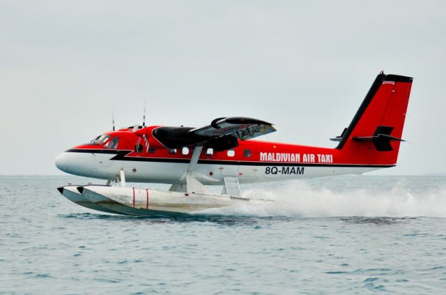 De Havilland Canada Twin Otter (8Q-MAM) - 2006 - Ellaidhoo Is., Seaplane landing in storm