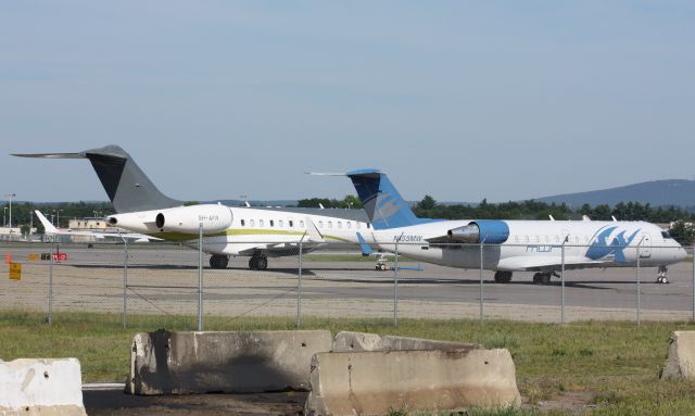 9H-AFR — - Parked next to Michael Waltrips CRJ for Nascar weekend