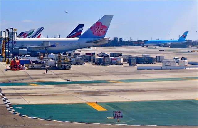 Boeing 747-400 (B-18207) - Sept. 2014. Bonus Blimp and A380 photo-bombing the tail composition