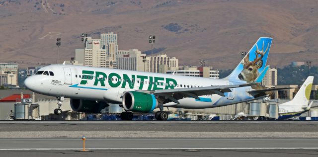 Airbus A320 (N301FR) - Frontiers "Wilbur the Whitetail" (N301FR) has the mains on the ground and the nose gear just about to touch the runway 16R concrete as it lands to complete the first half of a morning round trip KDEN-KRNO-KDEN run.