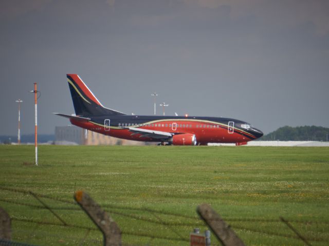 Boeing 737-500 (LY-KDT) - Standing on viewing mound at East Midlands Aeropark