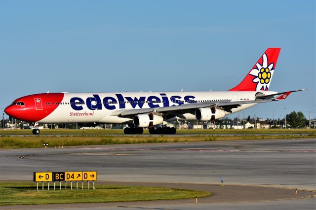 Airbus A340-300 (HB-JME) - Edelweiss Air Airbus A340-313 arriving at YYC on Aug 18.