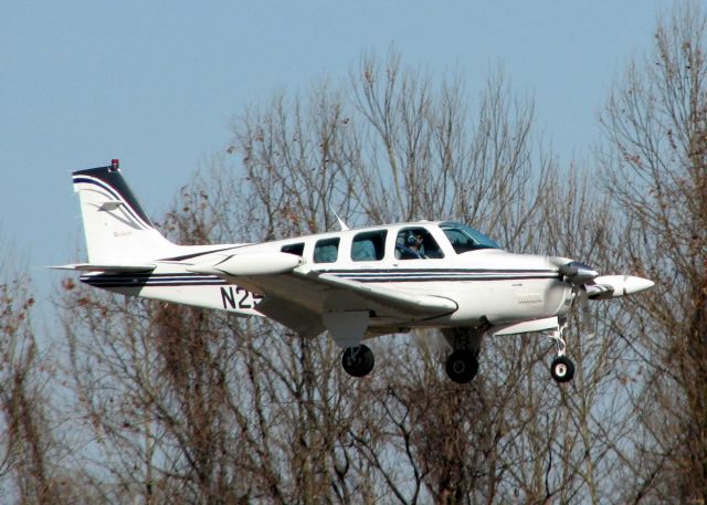 Beechcraft Bonanza (36) (N29TC) - Landing on runway 14 at Shreveports Downtown Airport.