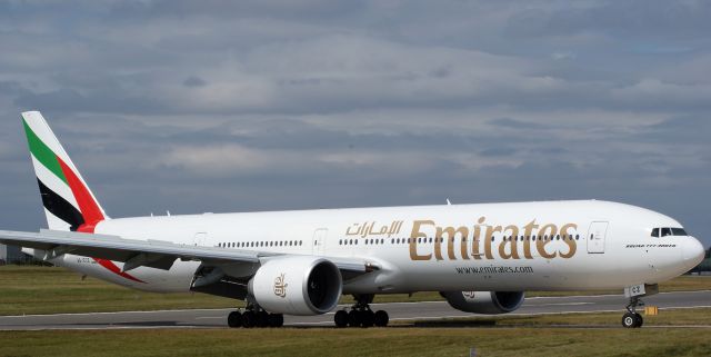 BOEING 777-300 (A6-ECZ) - Taxiing to terminal after landing Runway 15.