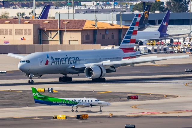 Boeing 777-200 (N779AN) - An American Airlines 777-200 landing at PHX on 2/13/23, the busiest day in PHX history, during the Super Bowl rush. Taken with a Canon R7 and Canon EF 100-400 II L lens.